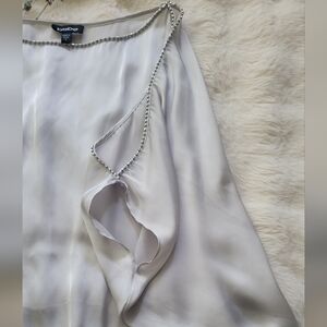 Bebe Asymmetrical Gray Blouse with Cut Out Design